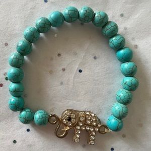 Last chance!Terquoise Colored stretchy beaded elephant bracelet with rhinestones